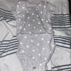 Carters NB onesie with hearts